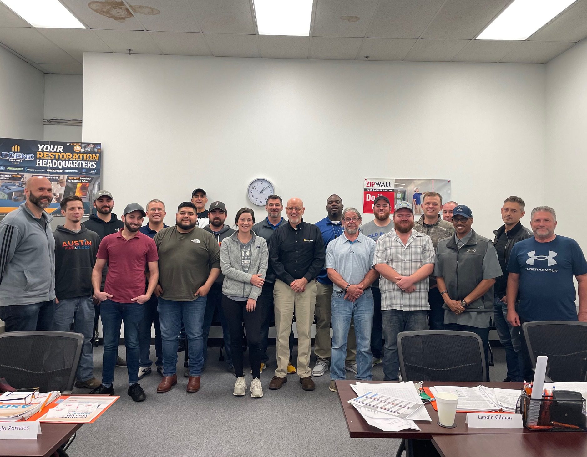 Group photo of students completing a hands-on IICRC training class at Atex